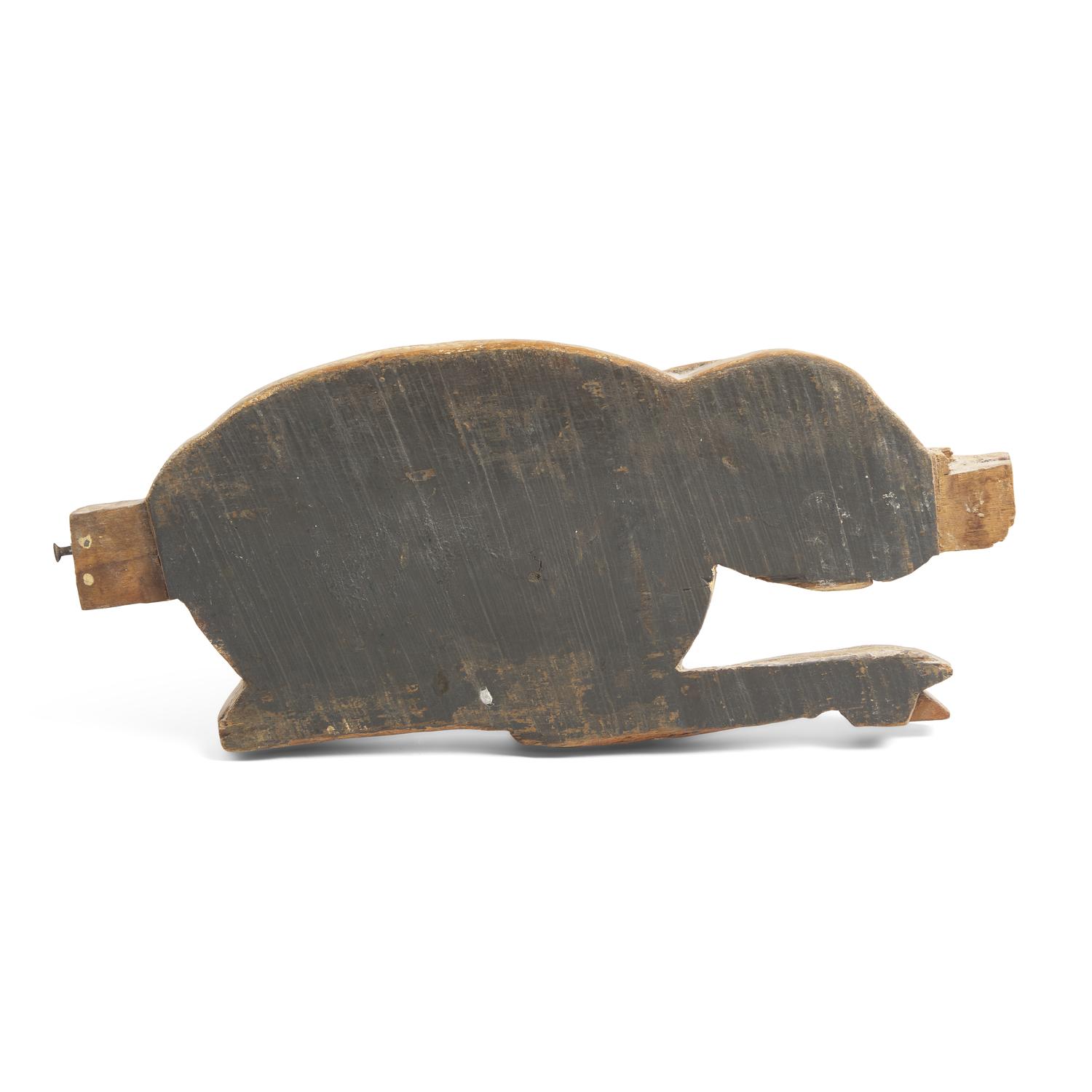 A Carved and Painted Figure of a Rabbit