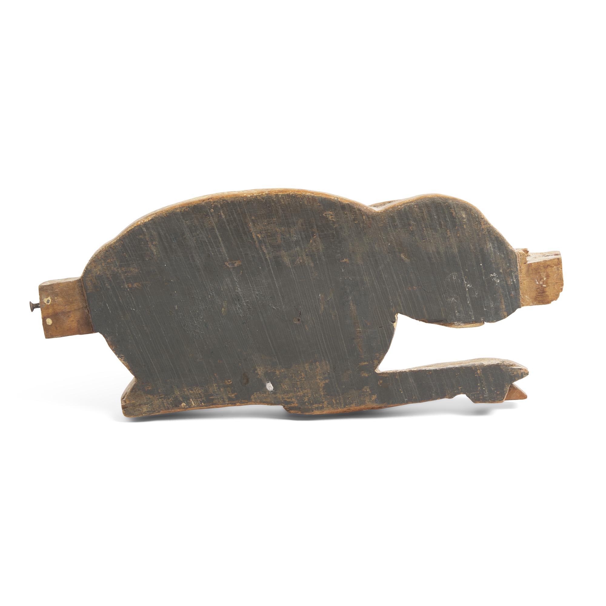 A Carved and Painted Figure of a Rabbit
