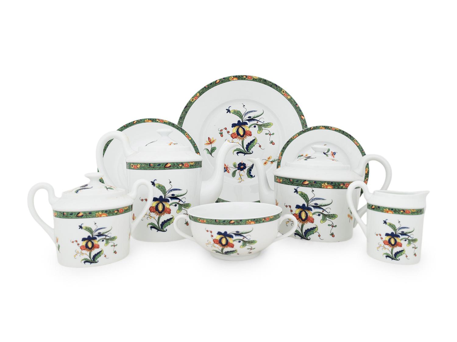 A Raynaud Limoges Porcelain Dinner Service