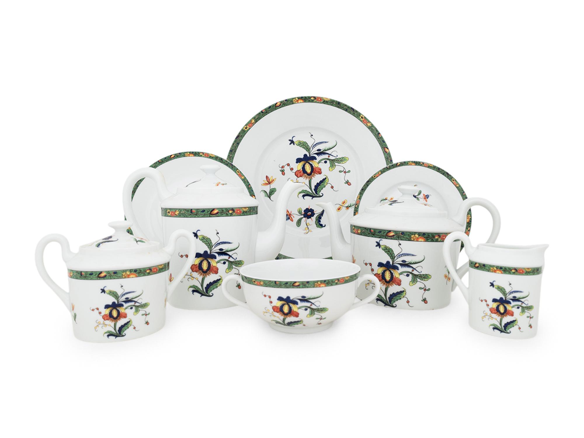A Raynaud Limoges Porcelain Dinner Service