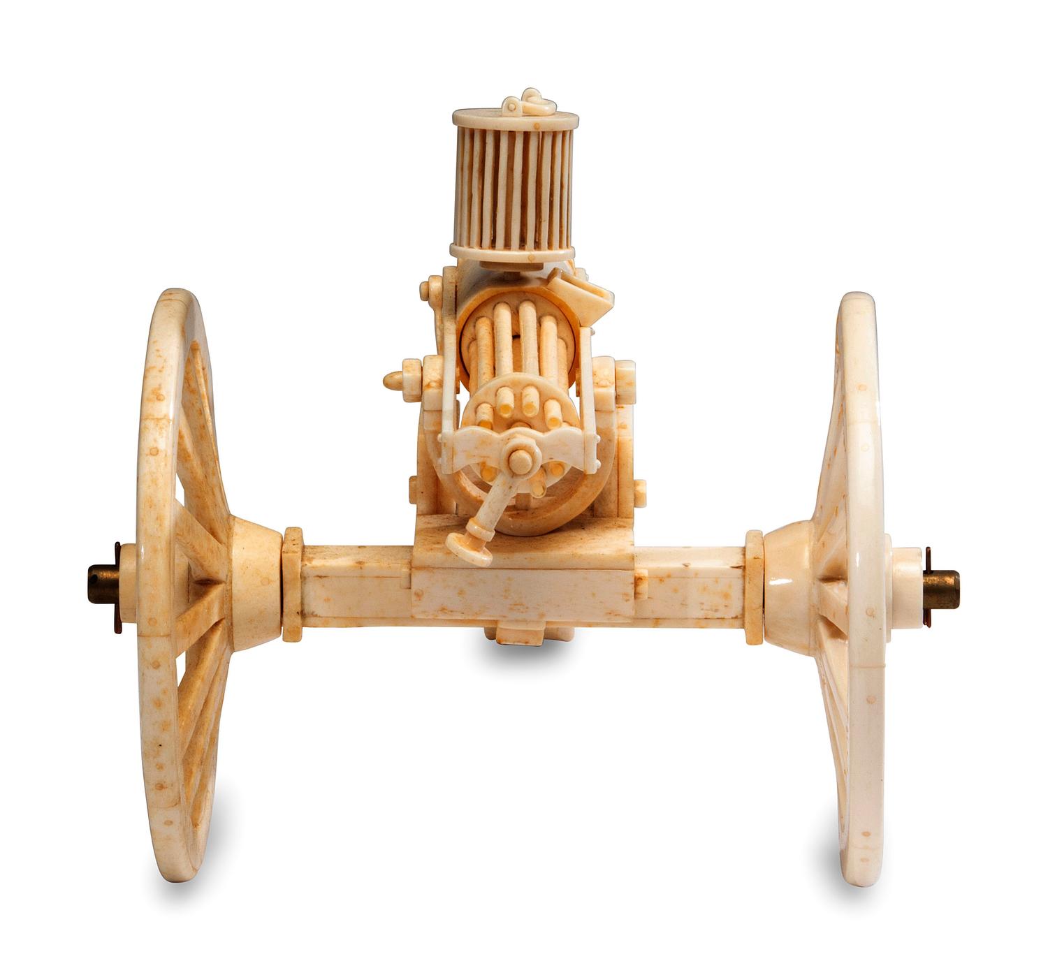 A Carved Walrus Ivory and Bone Gatling Gun Model