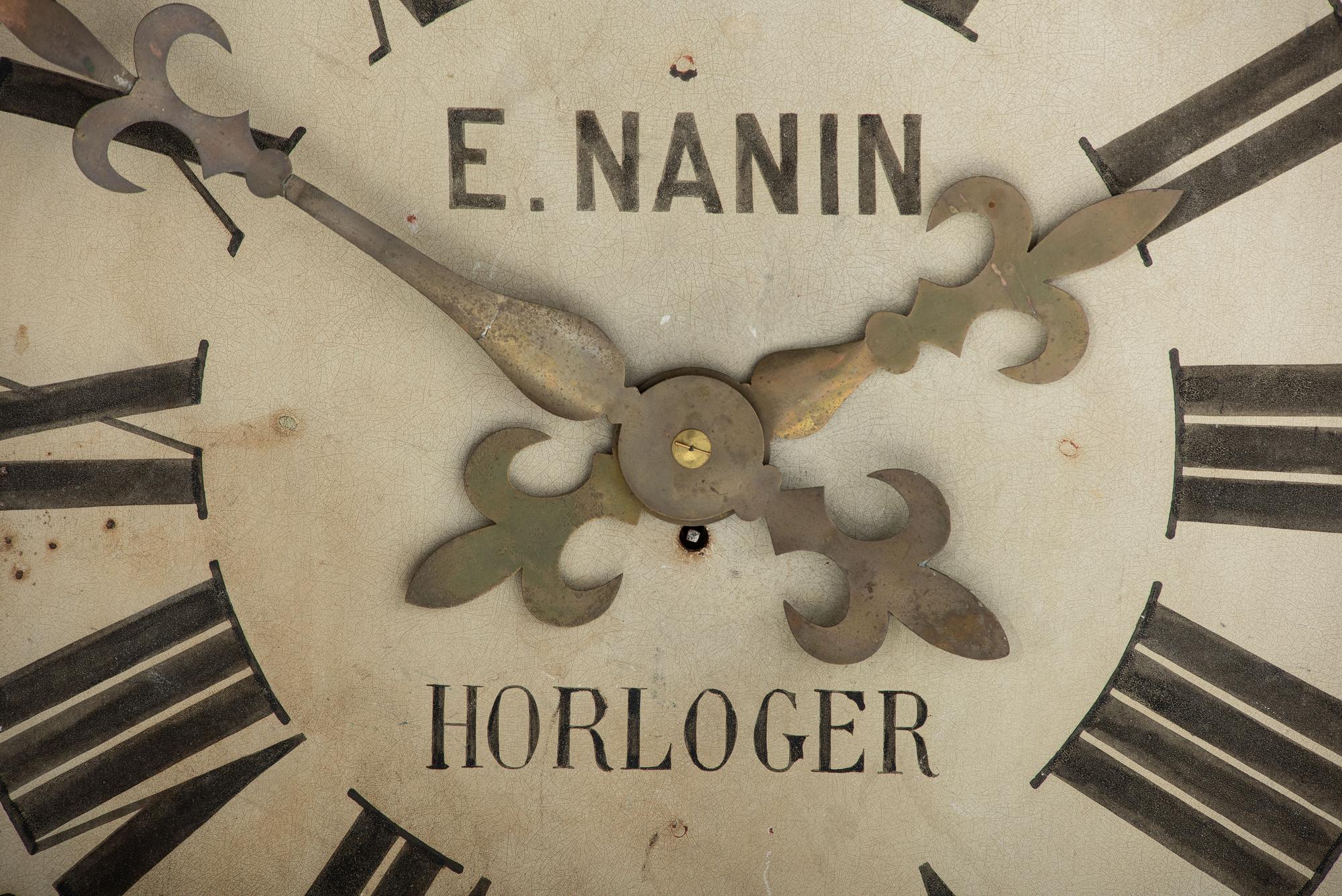 A French Painted and Parcel Gilt Tin Shop Wall Clock