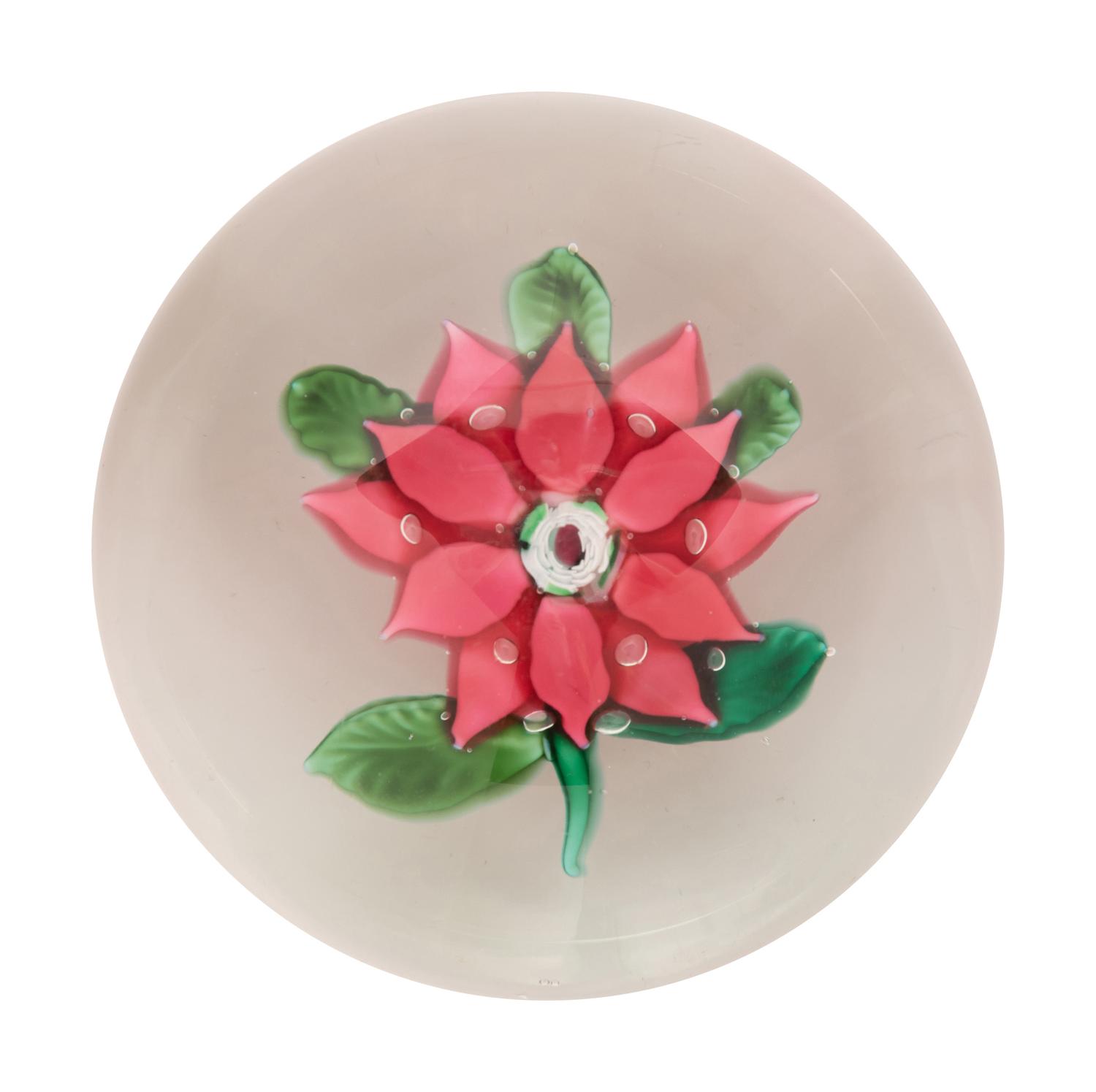 A Magenta Poinsettia Glass Paperweight