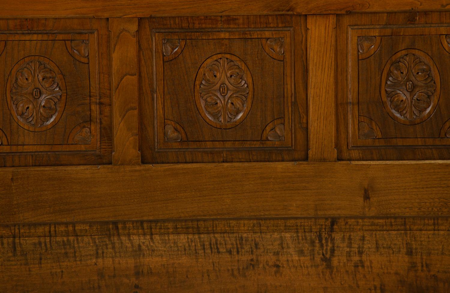A Renaissance Revival Carved Oak Headboard