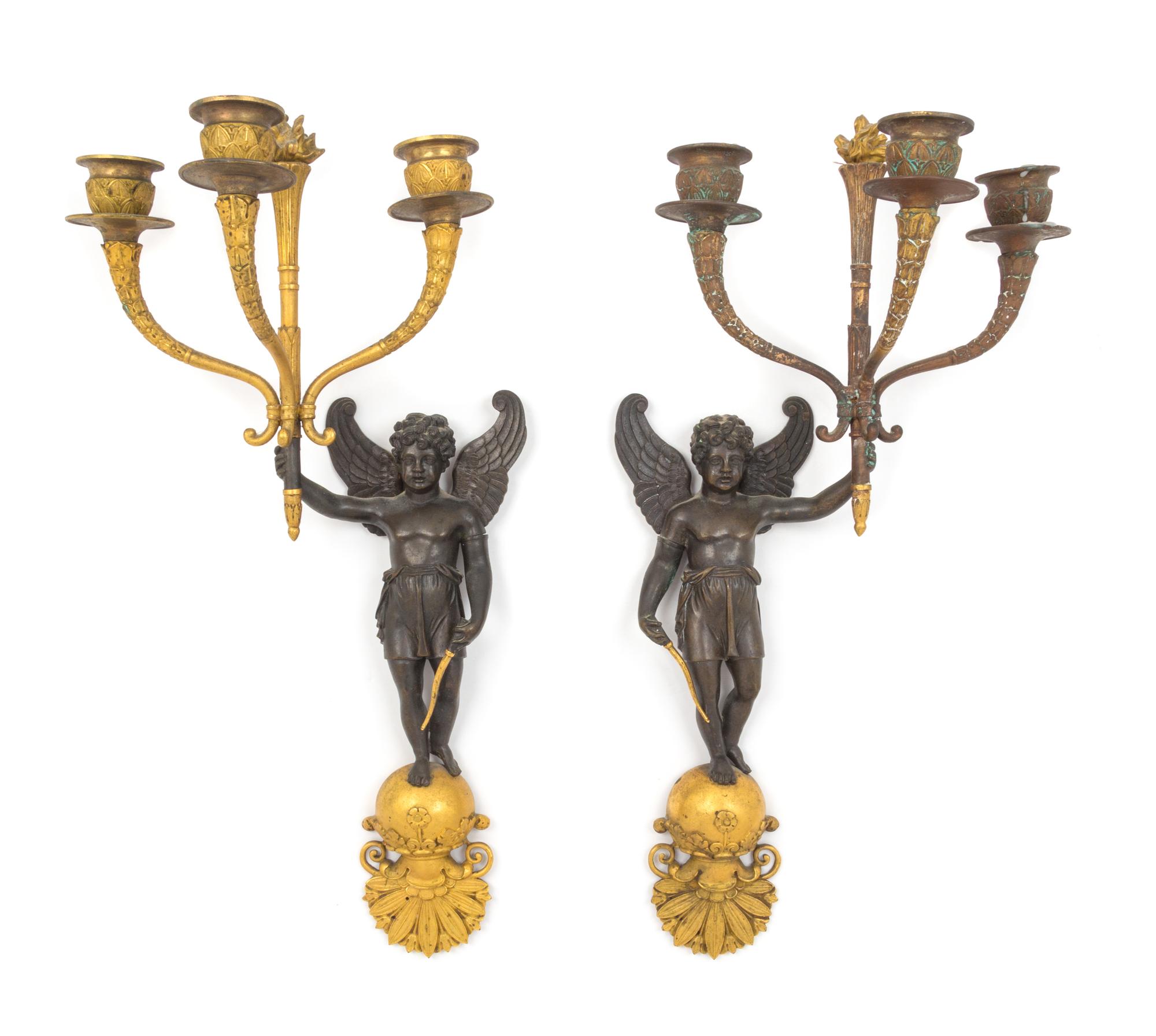 A Pair of Empire Gilt and Patinated Bronze Figural Three-Light Sconces Height 16 1/4 inches. — LATE 19TH CENTURY
