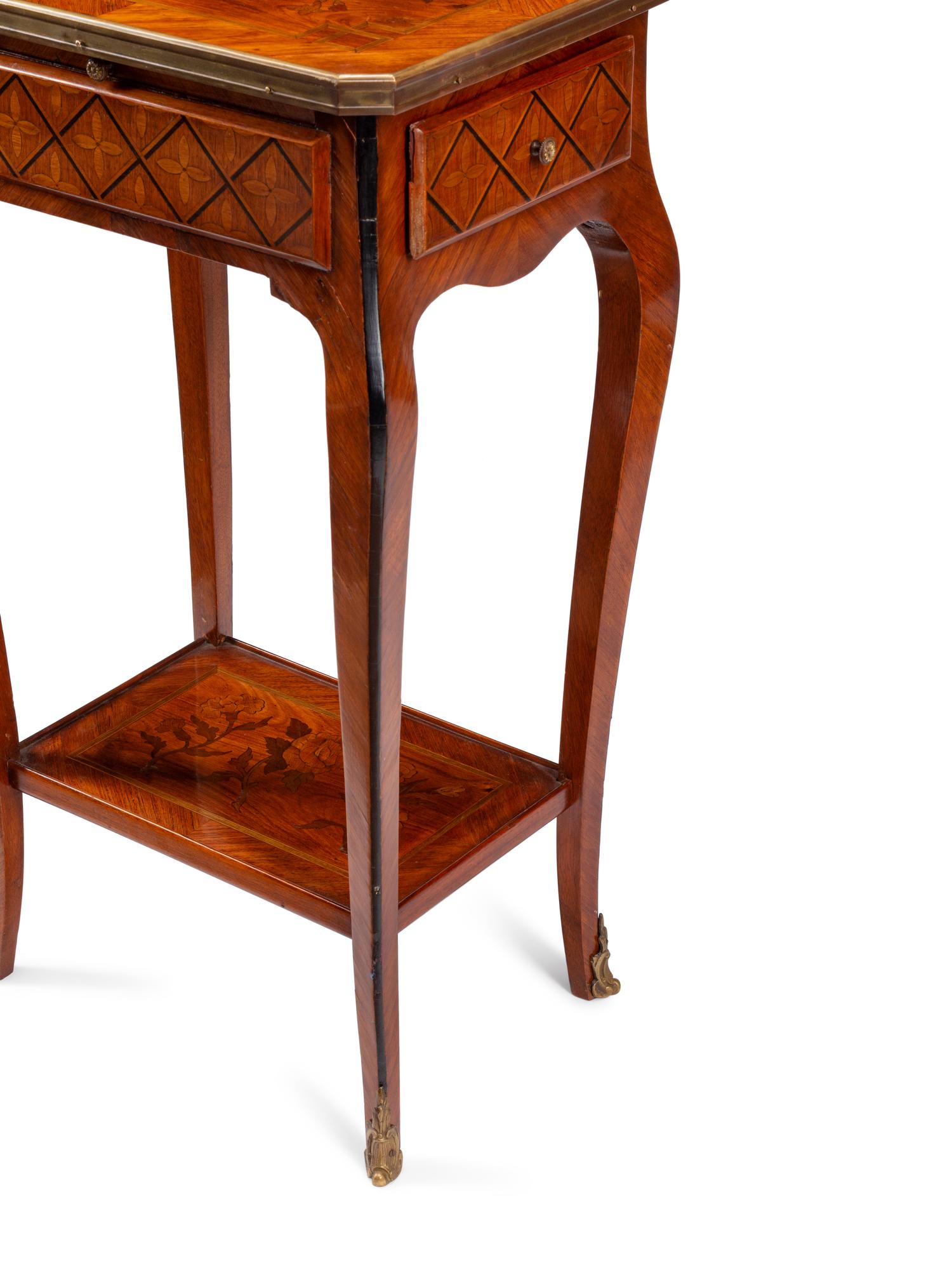 A Louis XV Style Gilt Bronze Mounted Marquetry Mechanical Table