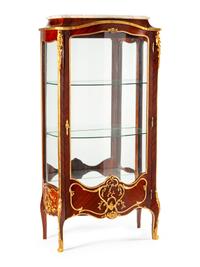 A Louis XV Style Gilt Metal Mounted Kingwood Vitrine