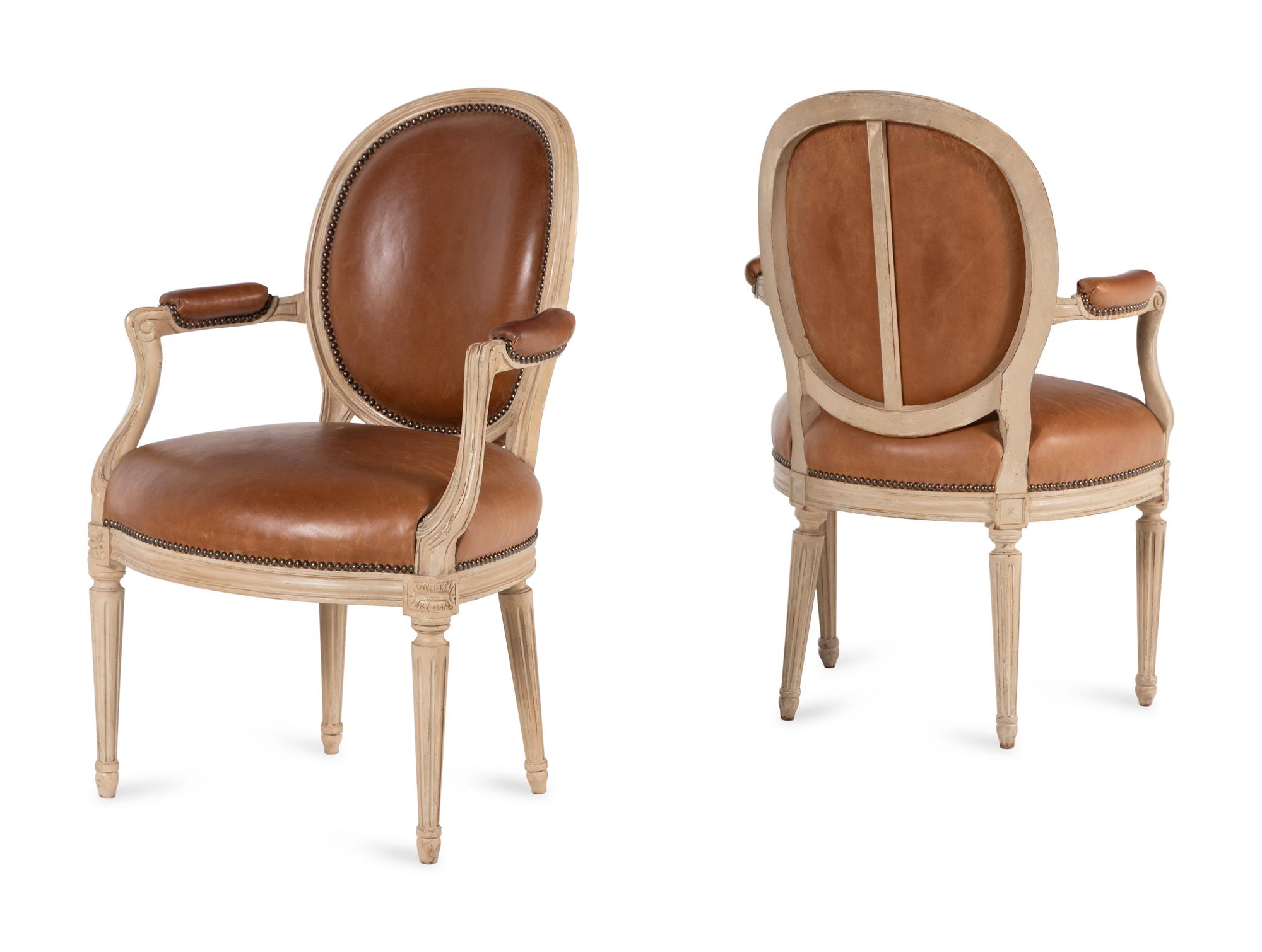 A Pair of Louis XVI Style White-Painted Fauteuils