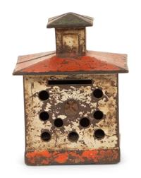 An Old Honesty Cast Iron Indian Cigar Bank, PLUS