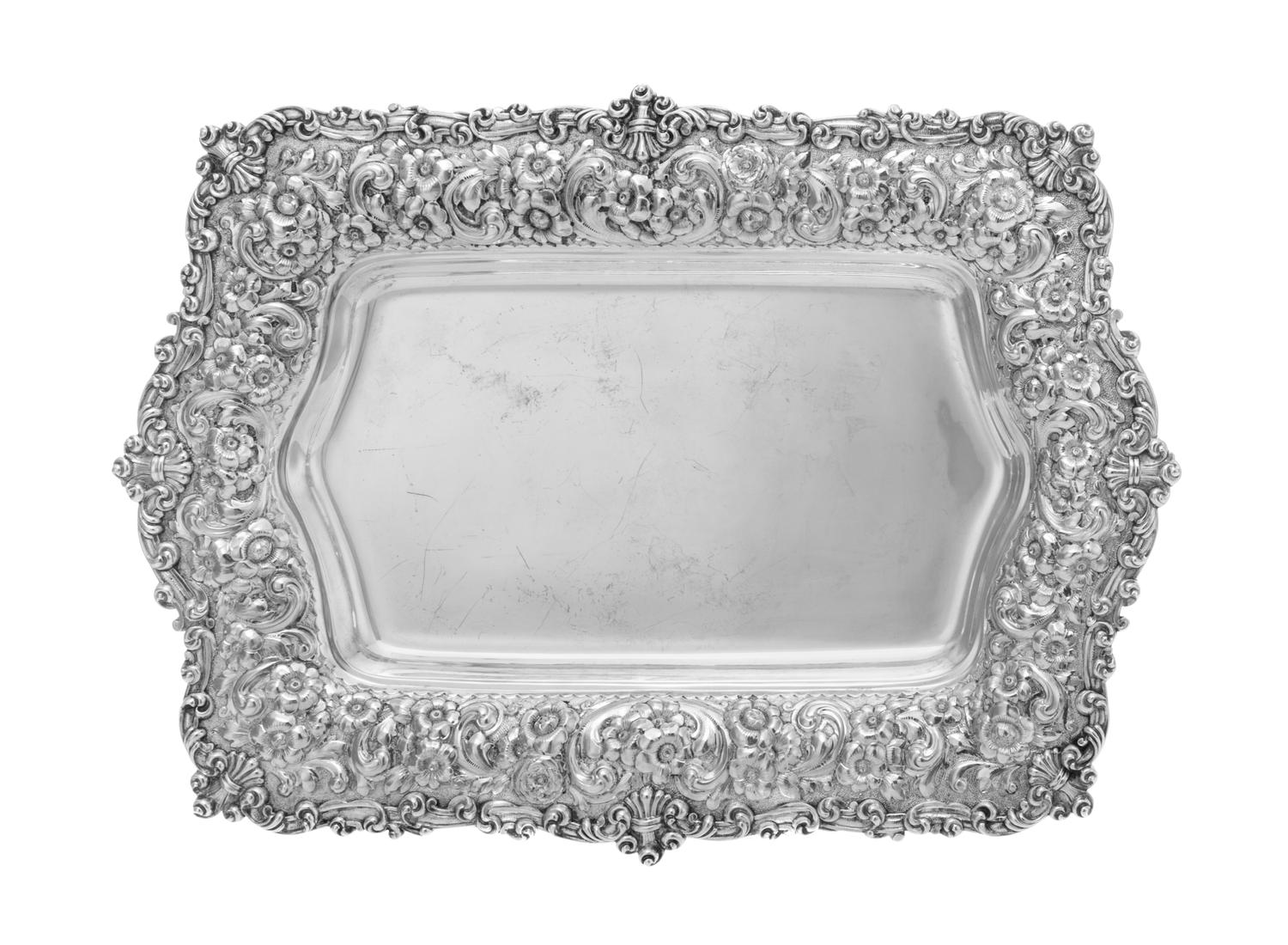 An American Silver Serving Tray, Bailey, Banks & Biddle, Philadelphia, PA, 1889, the rim worked with C-scroll and volute motifs, the bo
