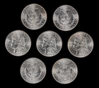 A Group of Seven United States 1888 Morgan Silver Dollar Coins