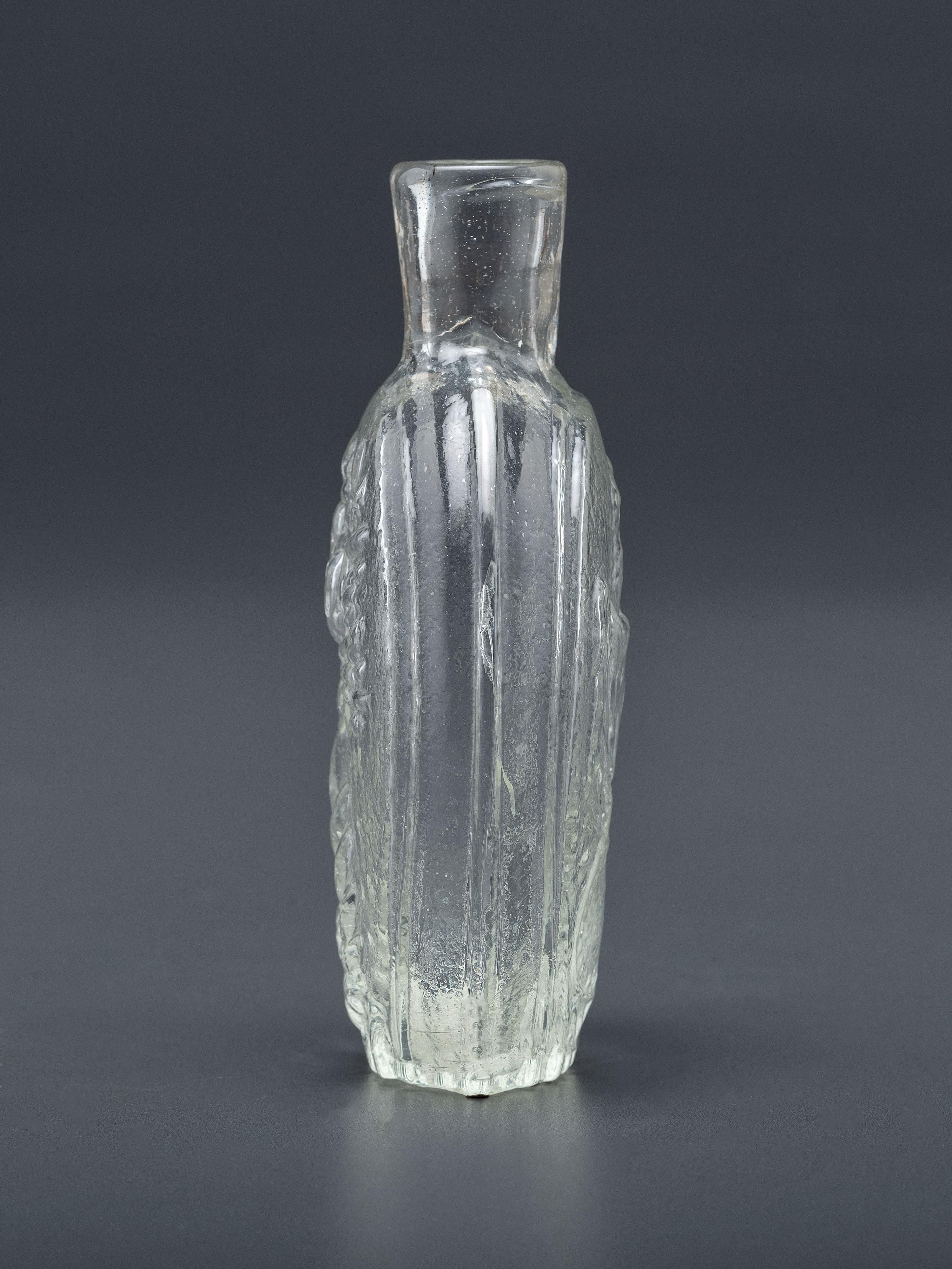 A Molded-Glass Pittsburg Flask in Clear