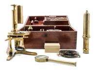 A French Brass Microscope Height 13 inches. — RETAILED BY WIDDLEFIELD & CO., BOSTON, MASSACHUSETTS, LATE 19TH CENTURY