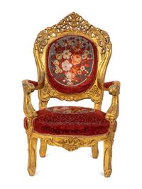 An Italian Rococo Style Giltwood Armchair — 20TH CENTURY