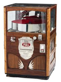 An Exhibit Supply Co. Novelty Candy Vender Claw Machine