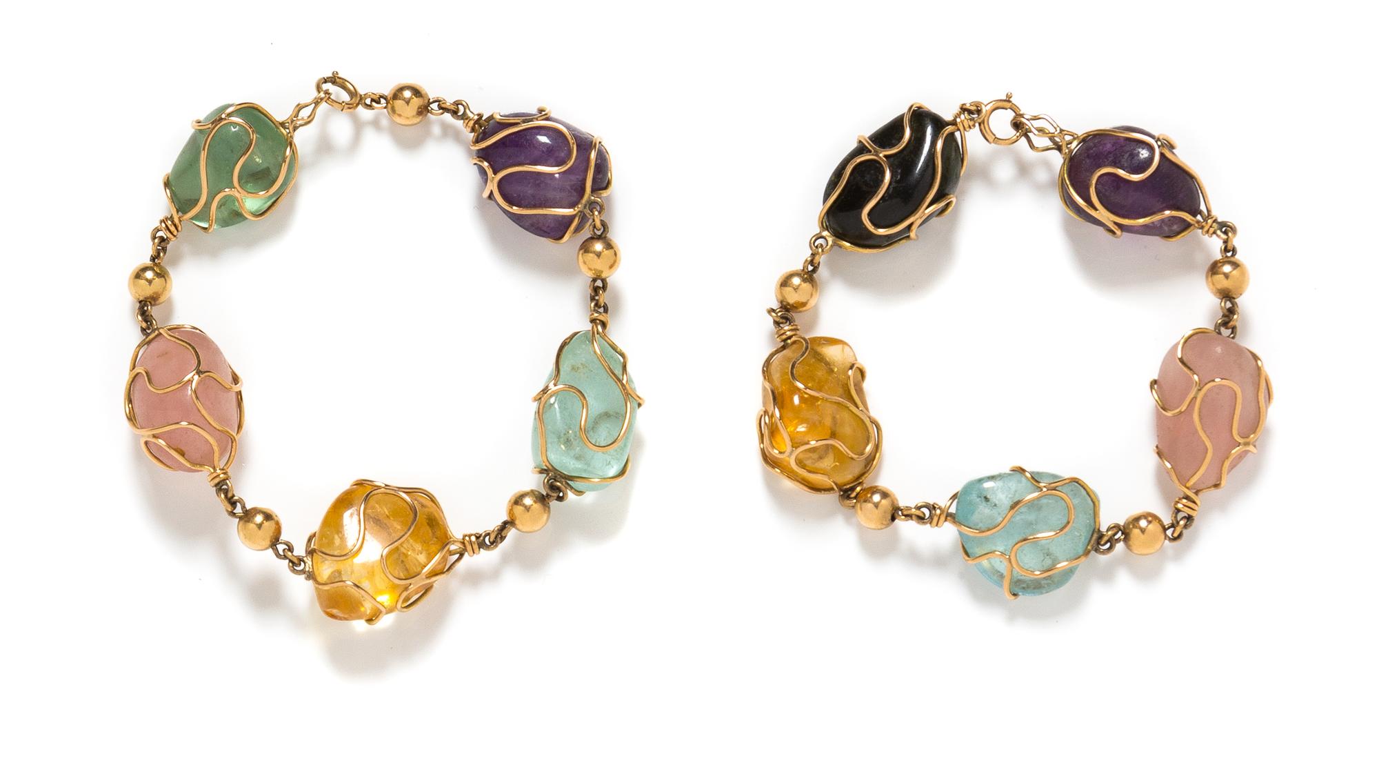 A Pair of Yellow Gold and Mulitgem Convertible Bracelets/Necklace, 51.70 dwts.