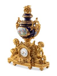 A French Gilt Bronze and Sèvres Style Porcelain Clock