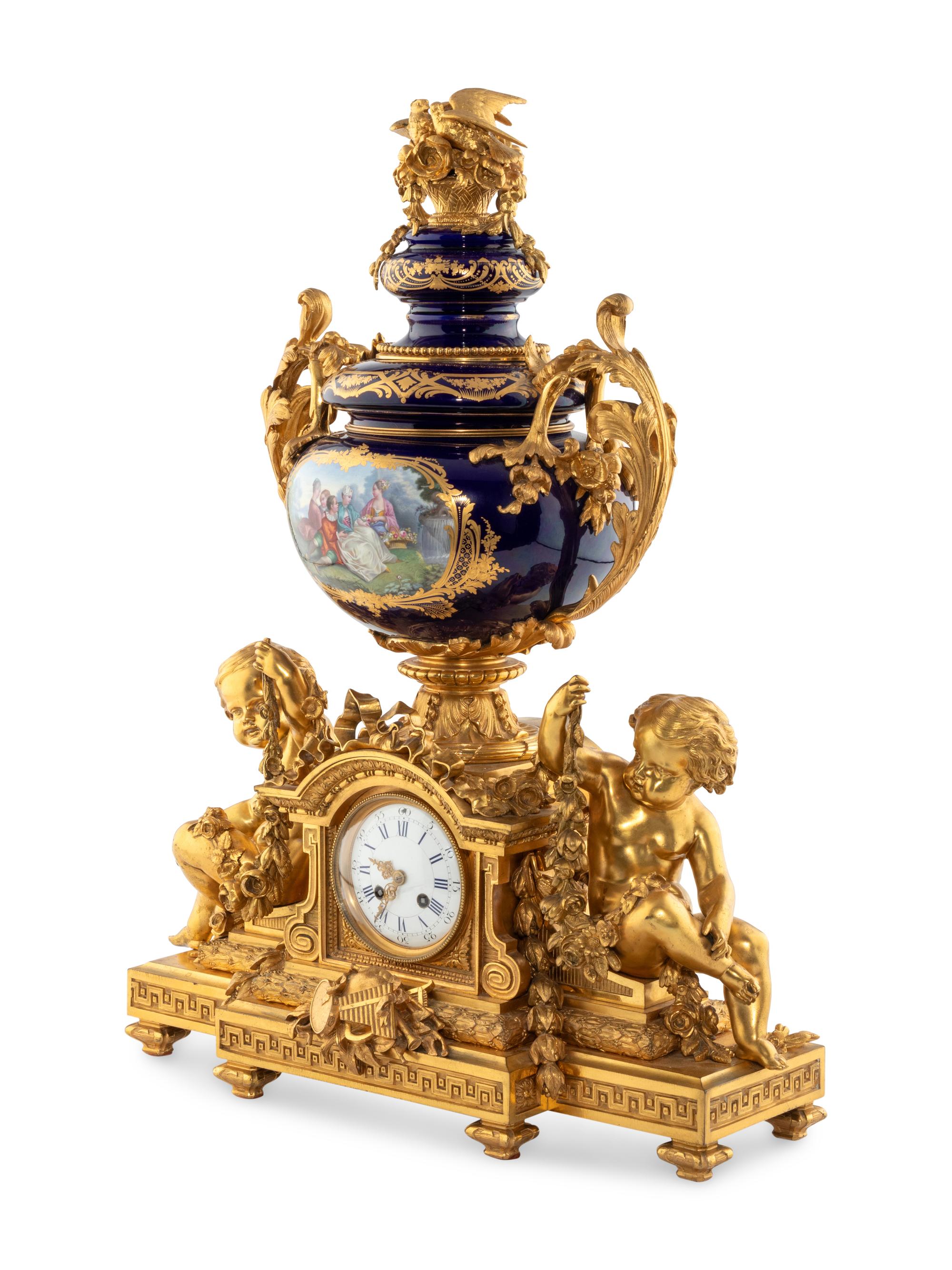 A French Gilt Bronze and Sèvres Style Porcelain Clock