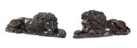 A Pair of Continental Bronze Models of Recumbent Lions