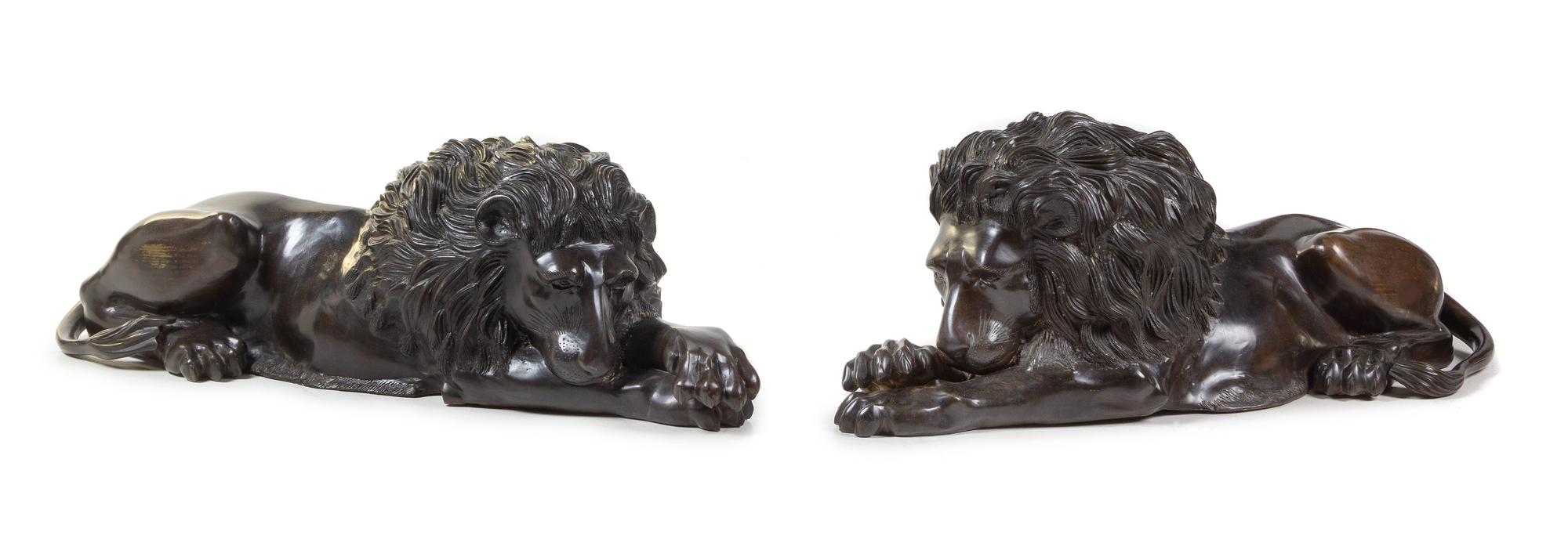 A Pair of Continental Bronze Models of Recumbent Lions