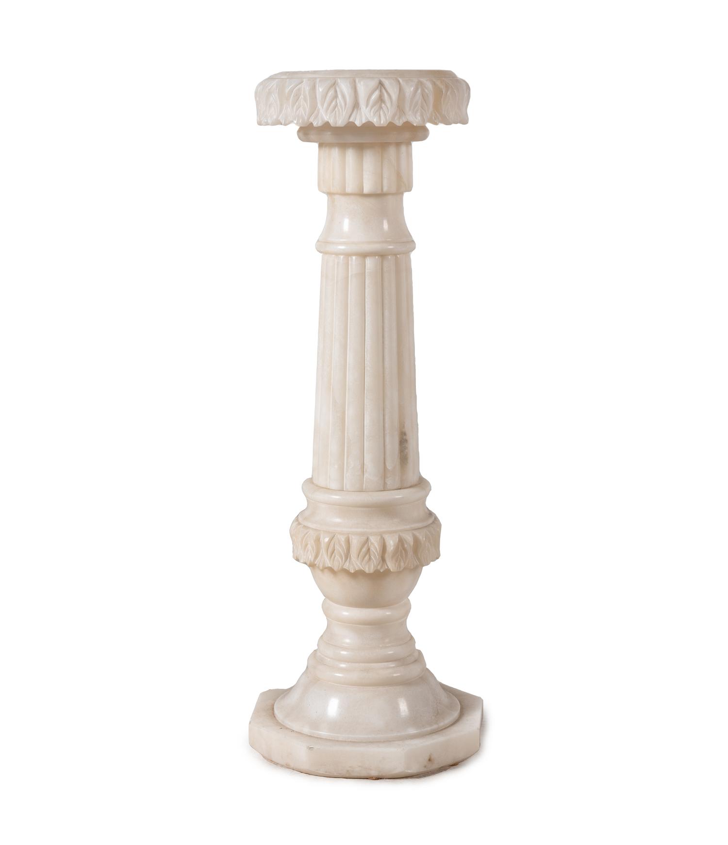 A Carved Alabaster Pedestal