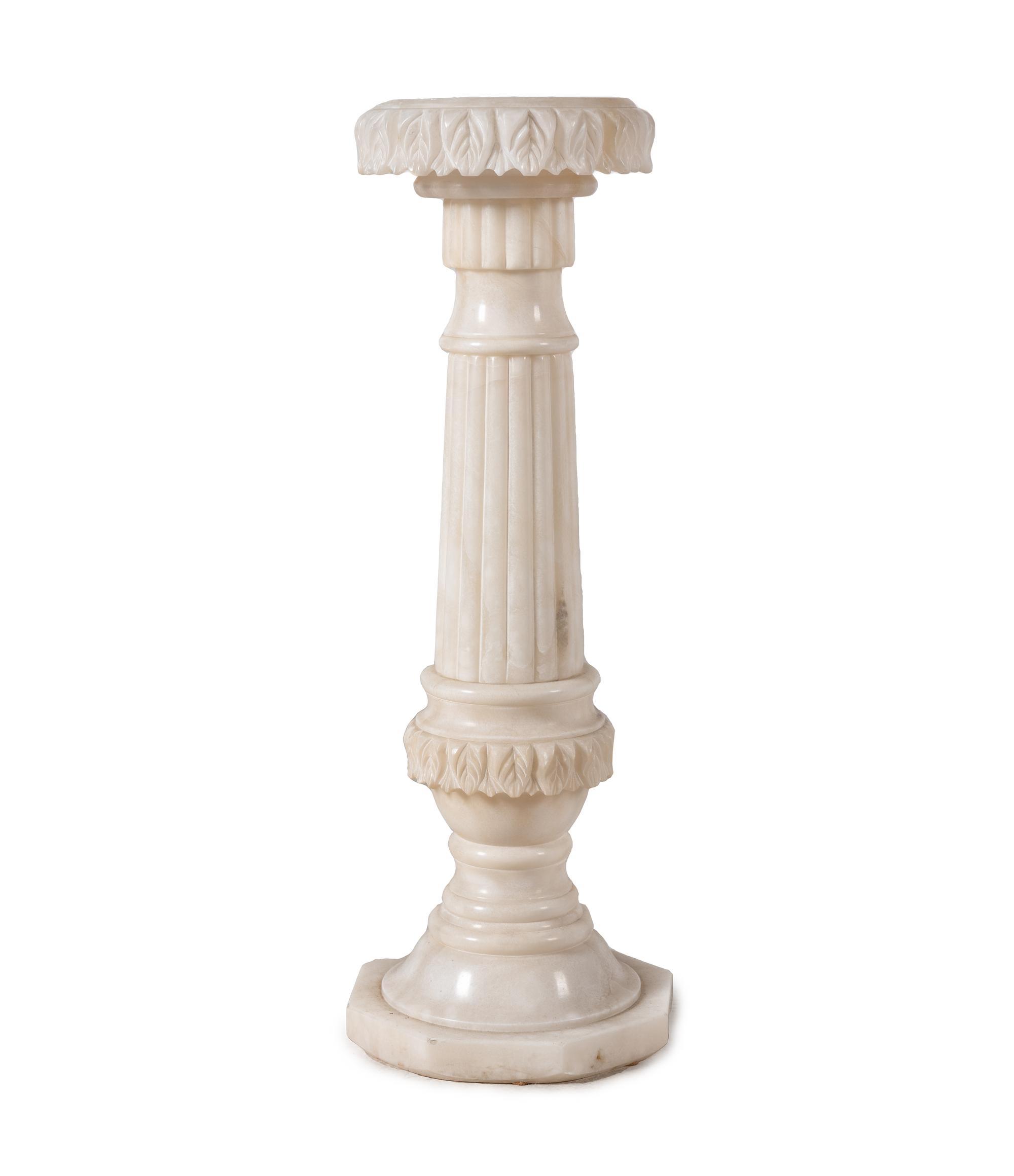A Carved Alabaster Pedestal