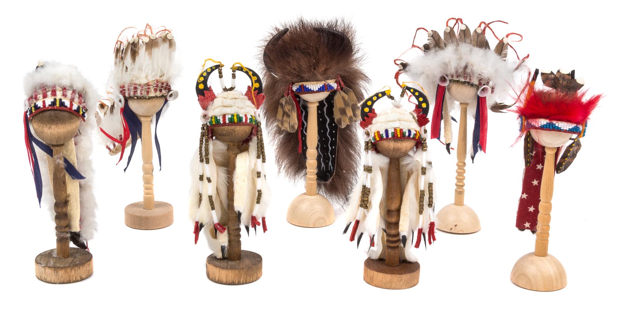 A Group of Seven Native American Style Headdresses Length of longest 4 1/4 inches. — Brian "Rainbow Hand" and Kathy Tepper