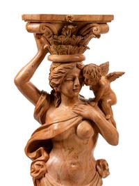 A Pair of Carved Marble Figural Pedestals