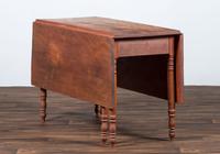 A Late Federal Cherrywood Drop-Leaf Dining Table