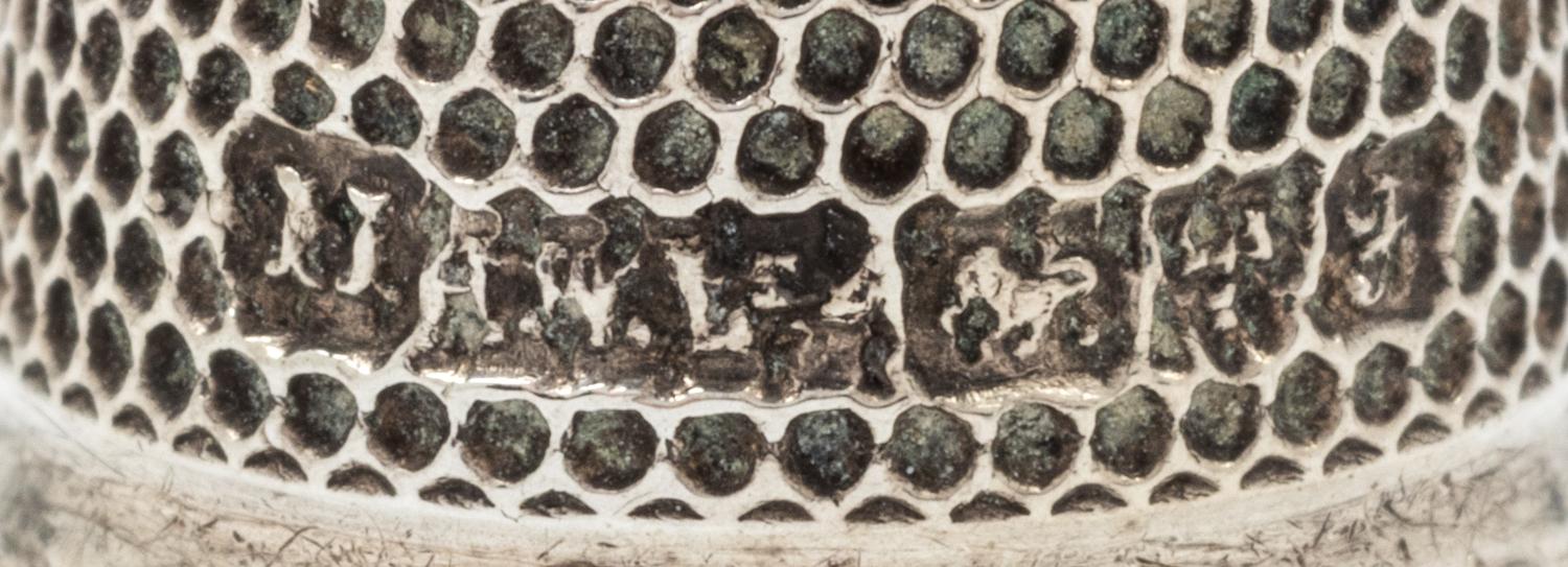 A Group of English Silver Thimbles, , comprising an example with a floral decorated rim, Joseph Swan and Sons, Birmingham, 1962, togeth