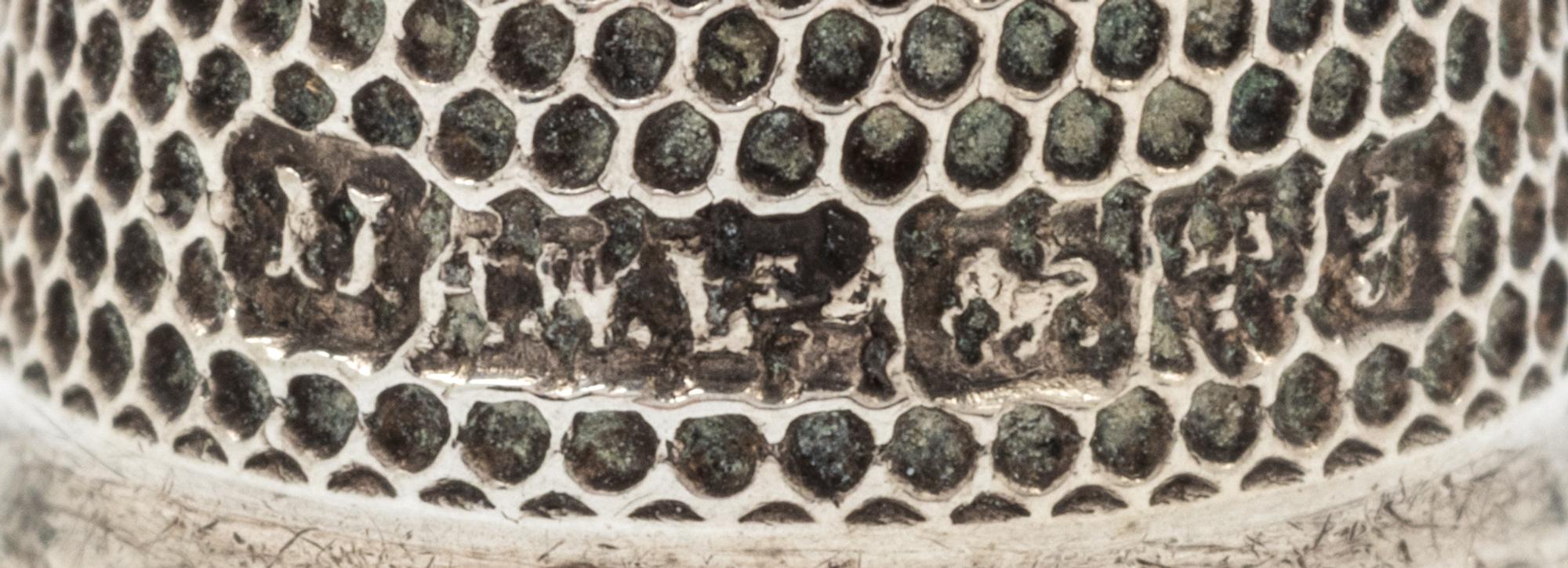 A Group of English Silver Thimbles, , comprising an example with a floral decorated rim, Joseph Swan and Sons, Birmingham, 1962, togeth