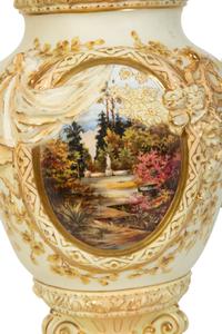 A Rudolstadt Painted and Parcel Gilt Porcelain Lidded Urn