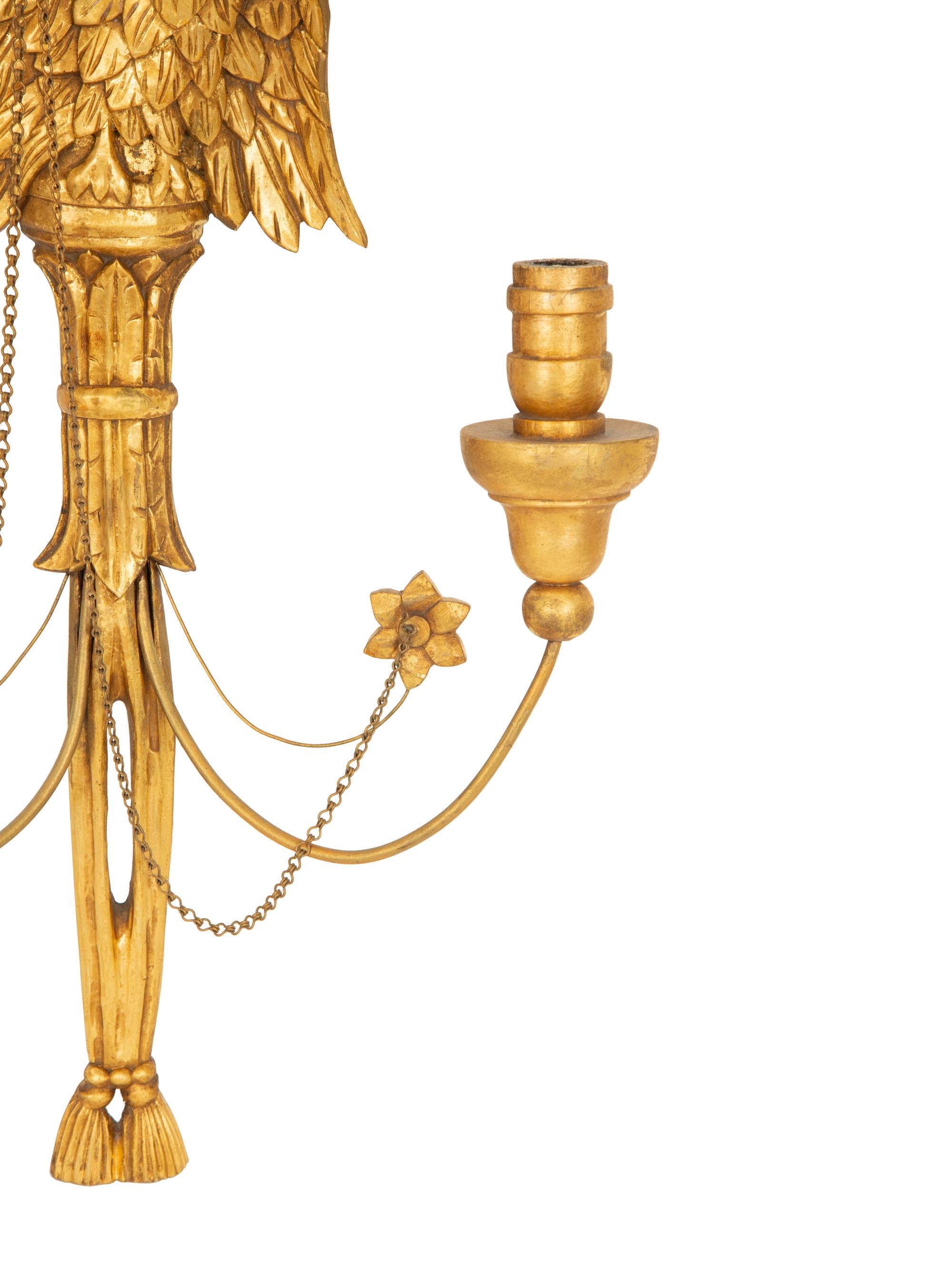 A Pair of Italian Gilt Wood Two Light Eagle Wall Sconces