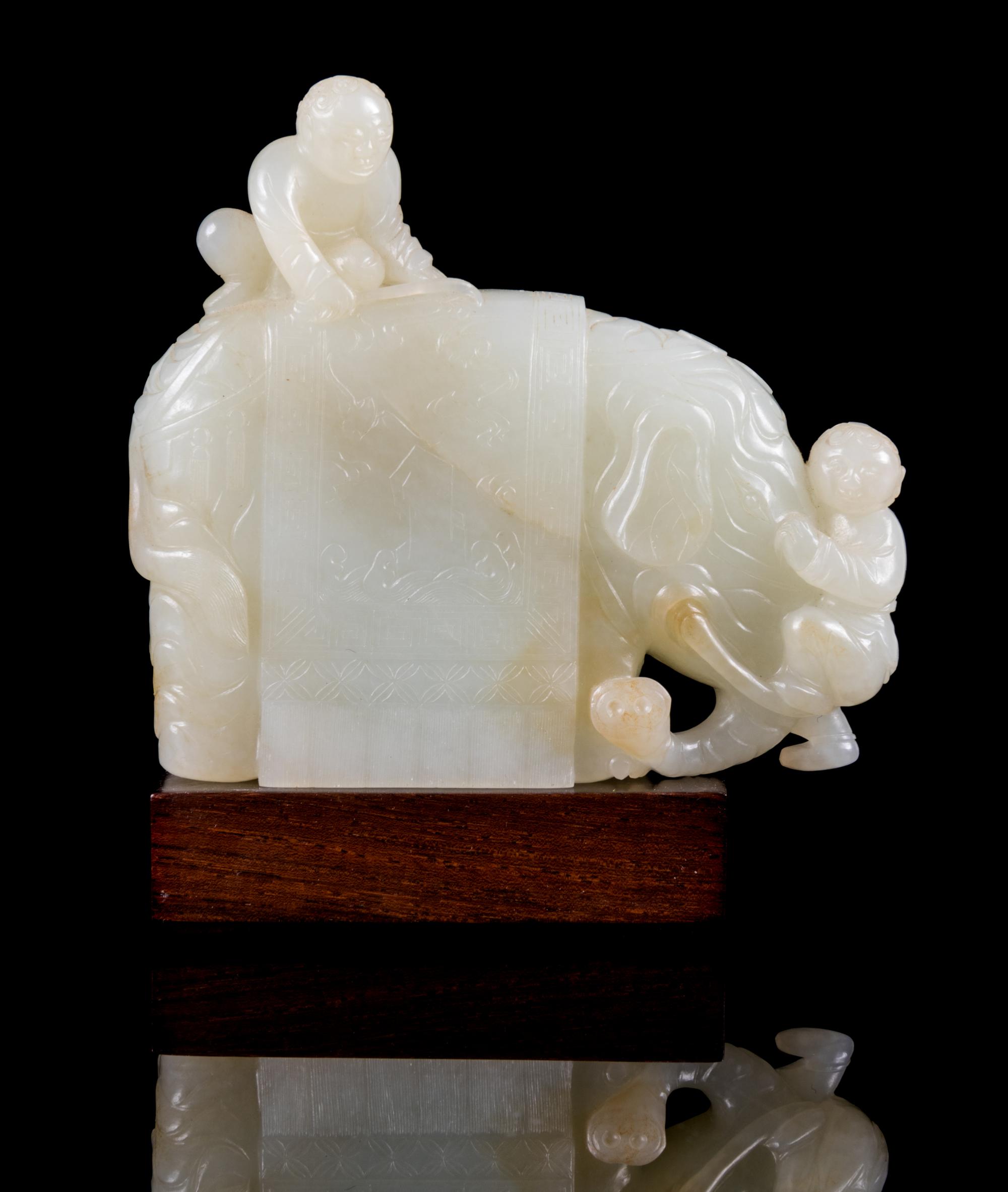 A Pale Celadon Jade Figure of an Elephant and Boys Height 3 1/2 inches. — 18TH CENTURY