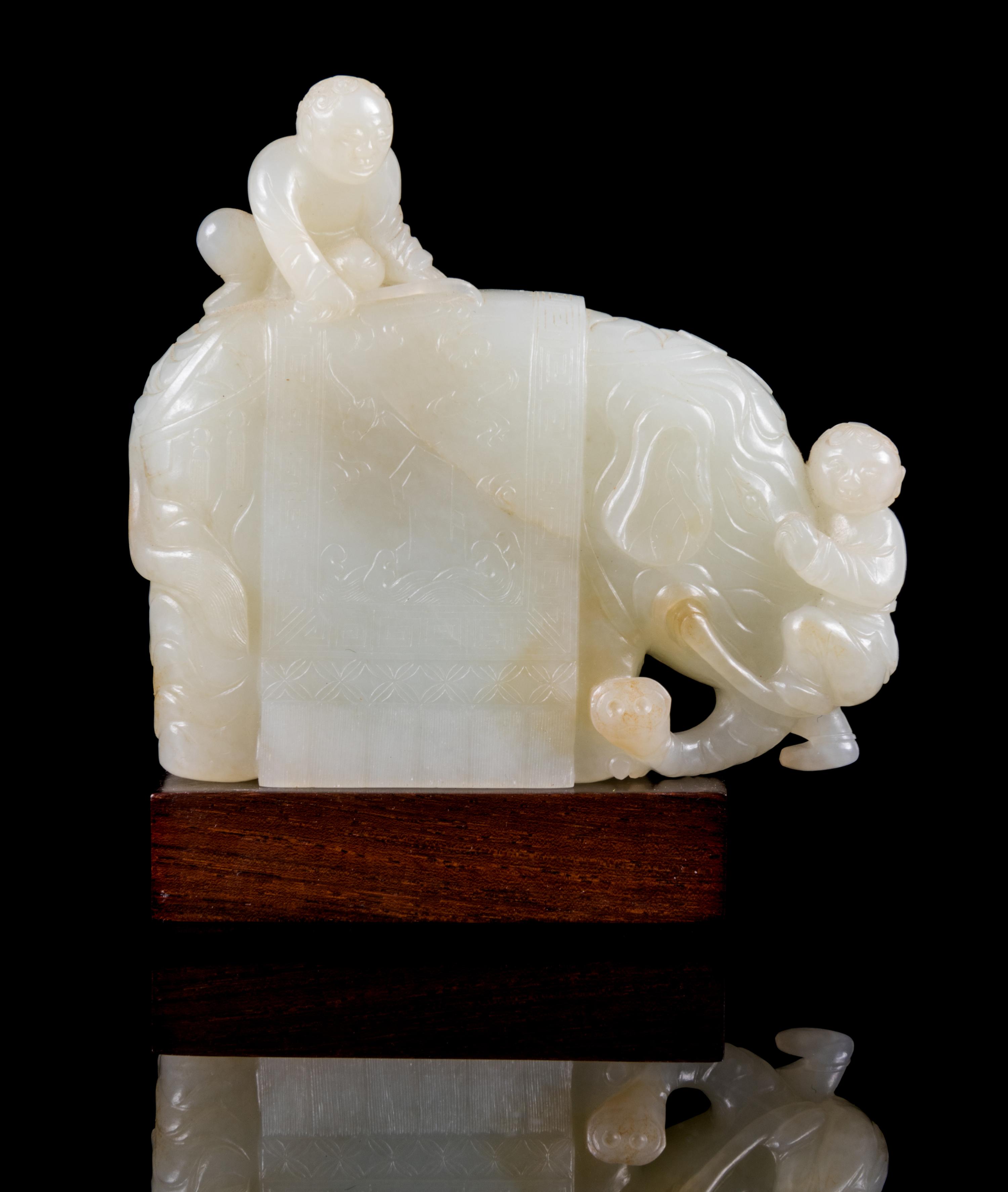 A Pale Celadon Jade Figure of an Elephant and Boys Height 3 1/2 inches. — 18TH CENTURY