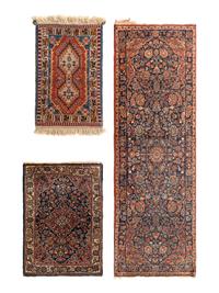 A Group of Three Wool Rugs