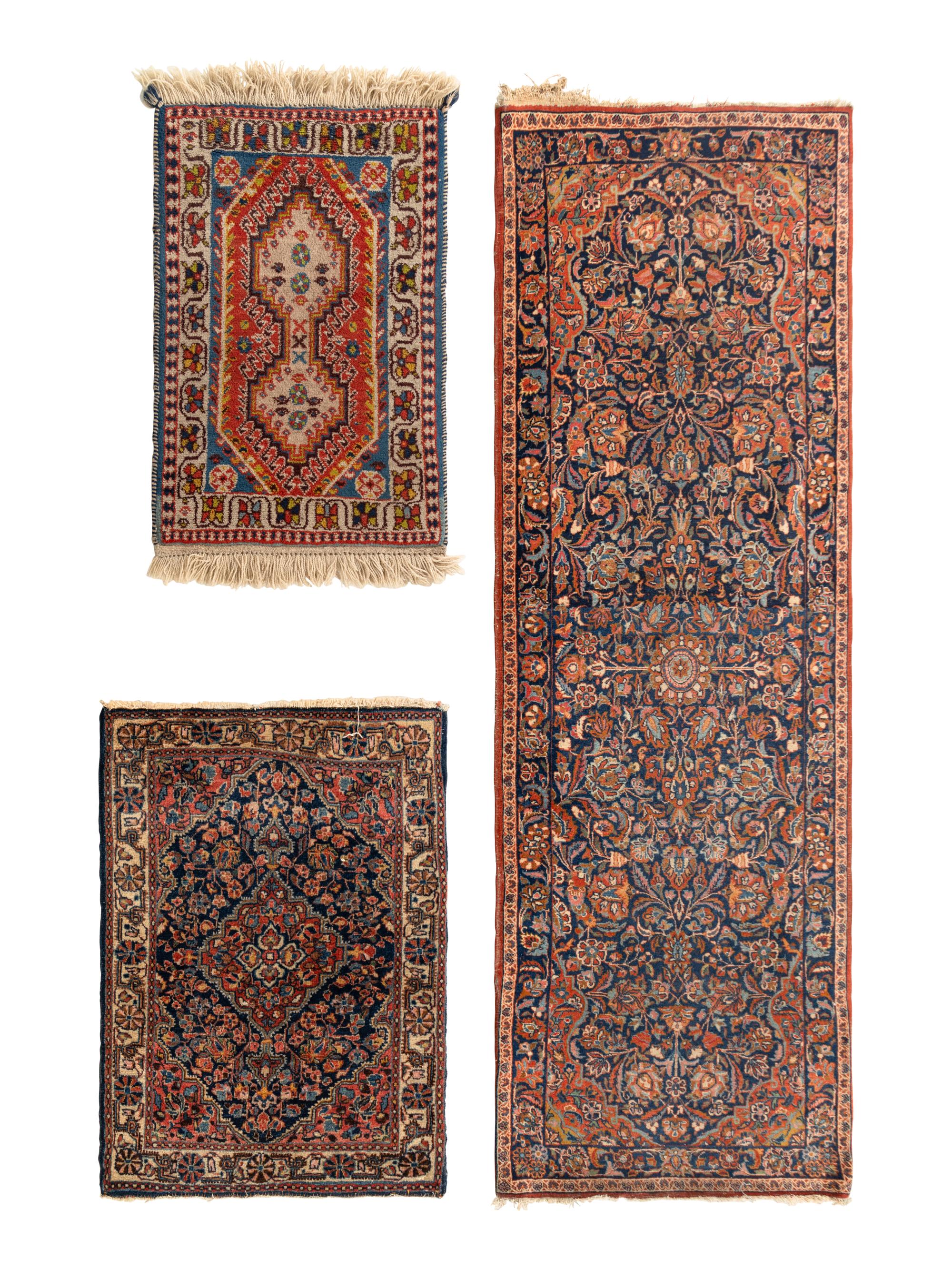 A Group of Three Wool Rugs