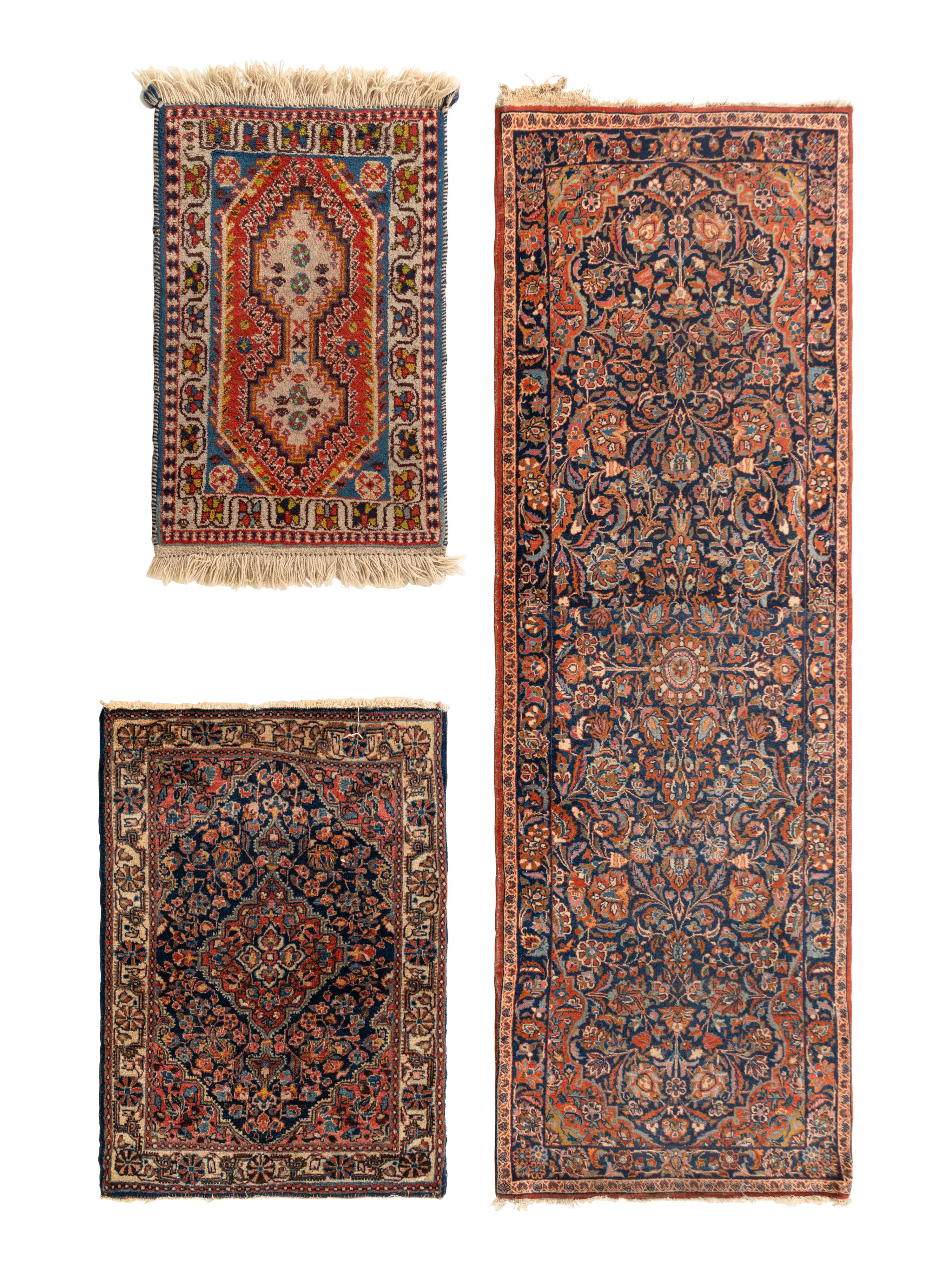 A Group of Three Wool Rugs