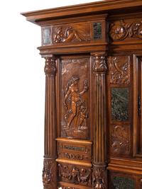 A French Renaissance Revival Carved Walnut and Marble-Inset Court Cupboard