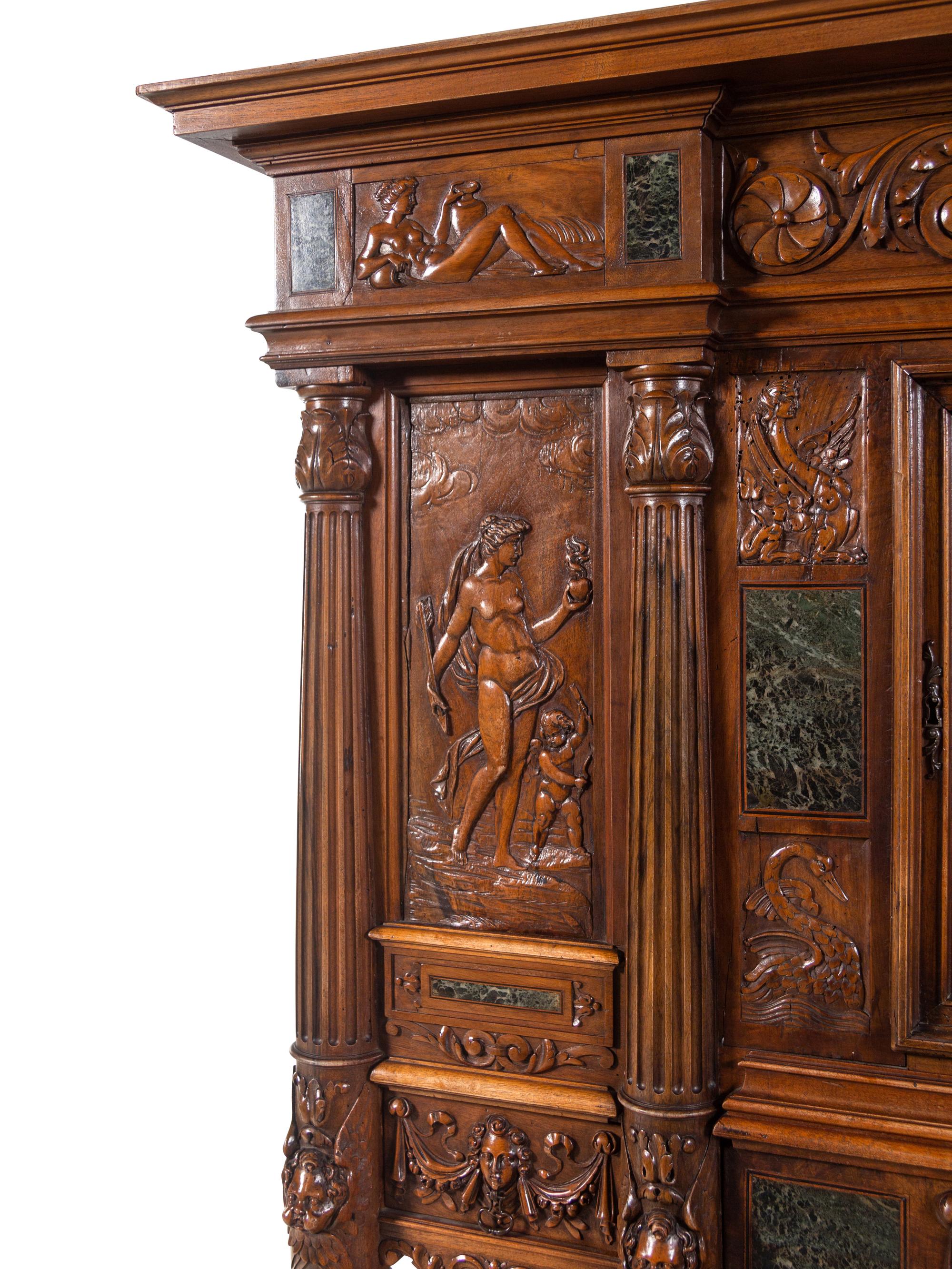 A French Renaissance Revival Carved Walnut and Marble-Inset Court Cupboard
