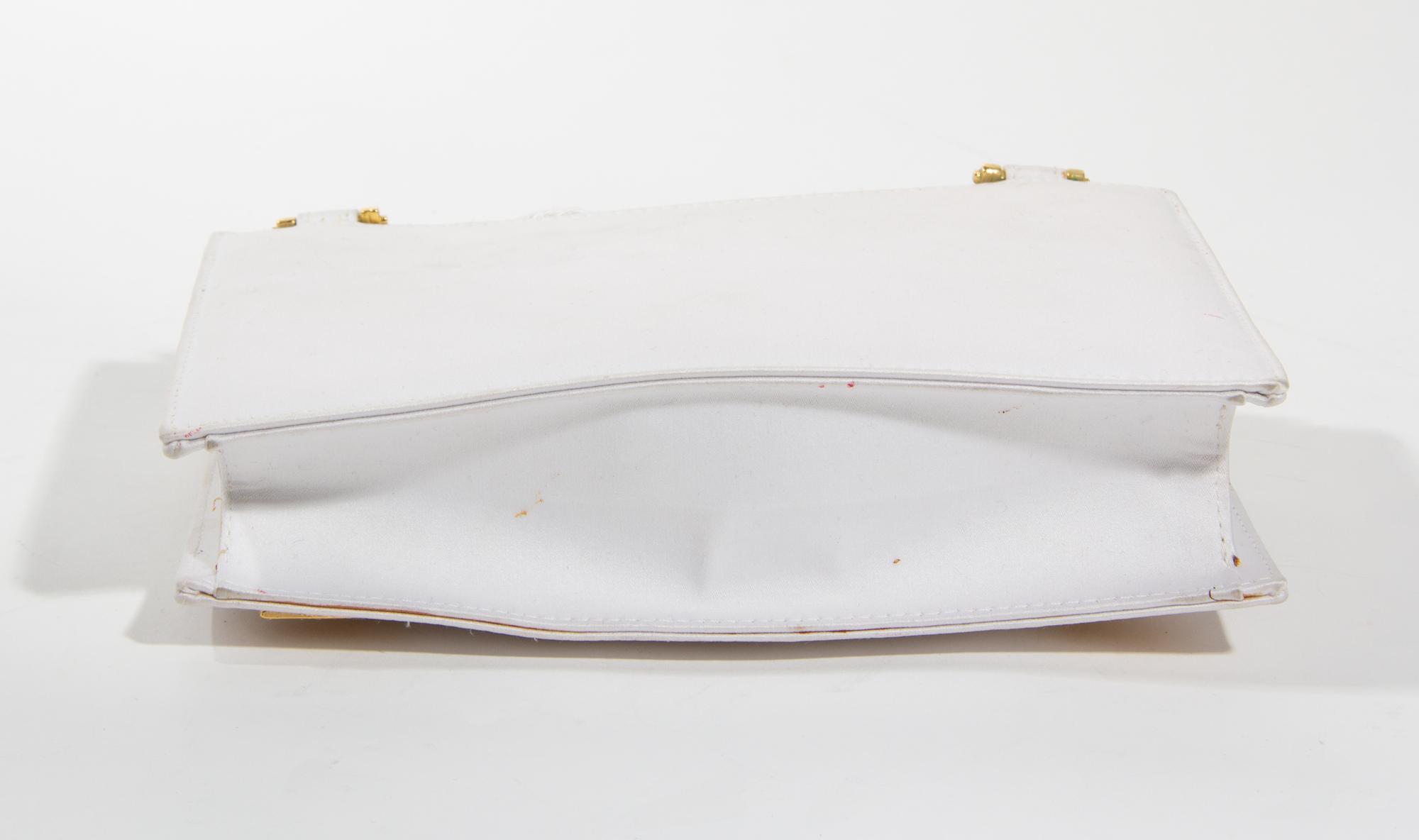 A Gianni Versace White Silk Medusa Shoulder Bag, 9" x 6" x 2".
