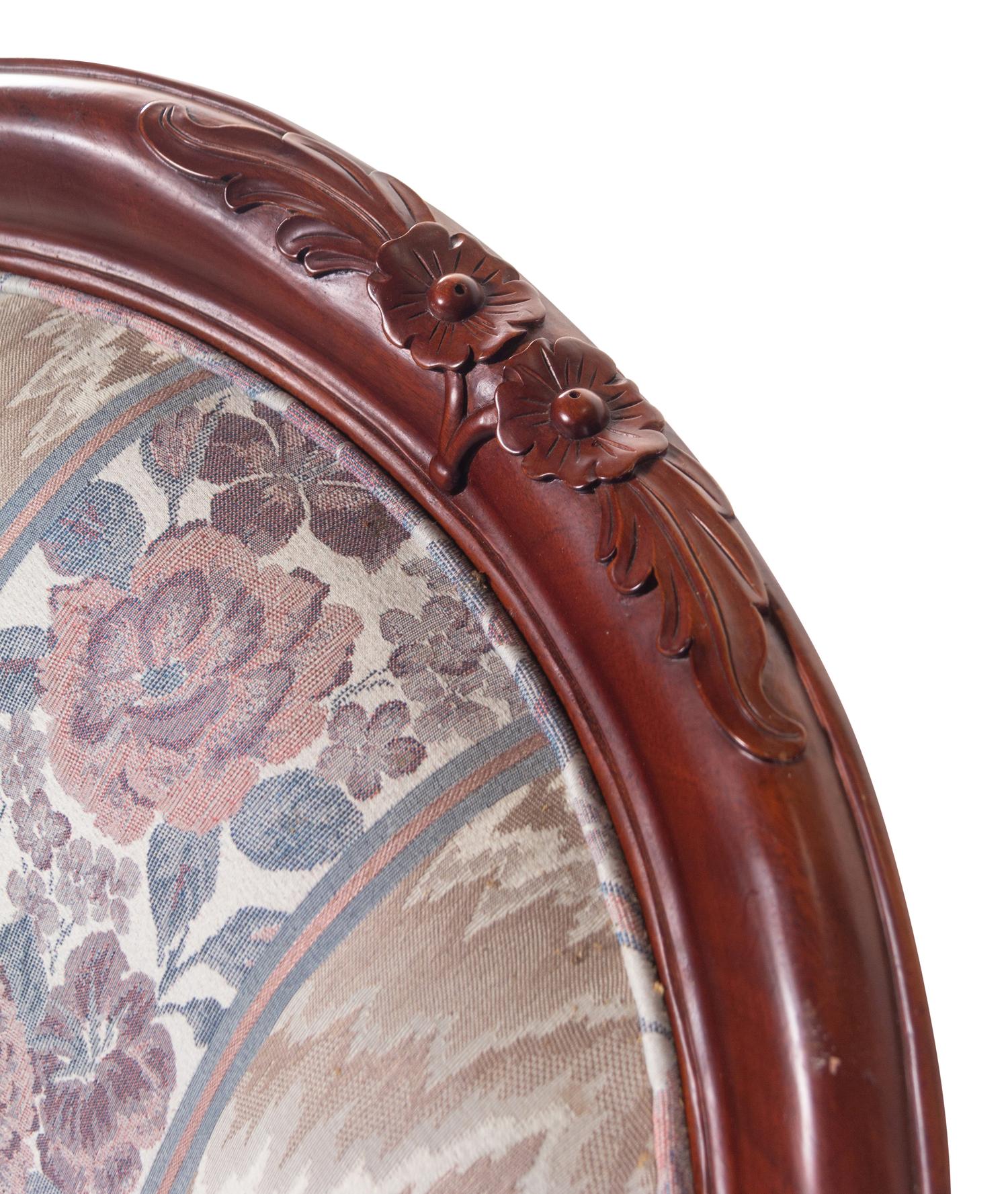 A Pair of Victorian Style Carved Walnut Armchairs