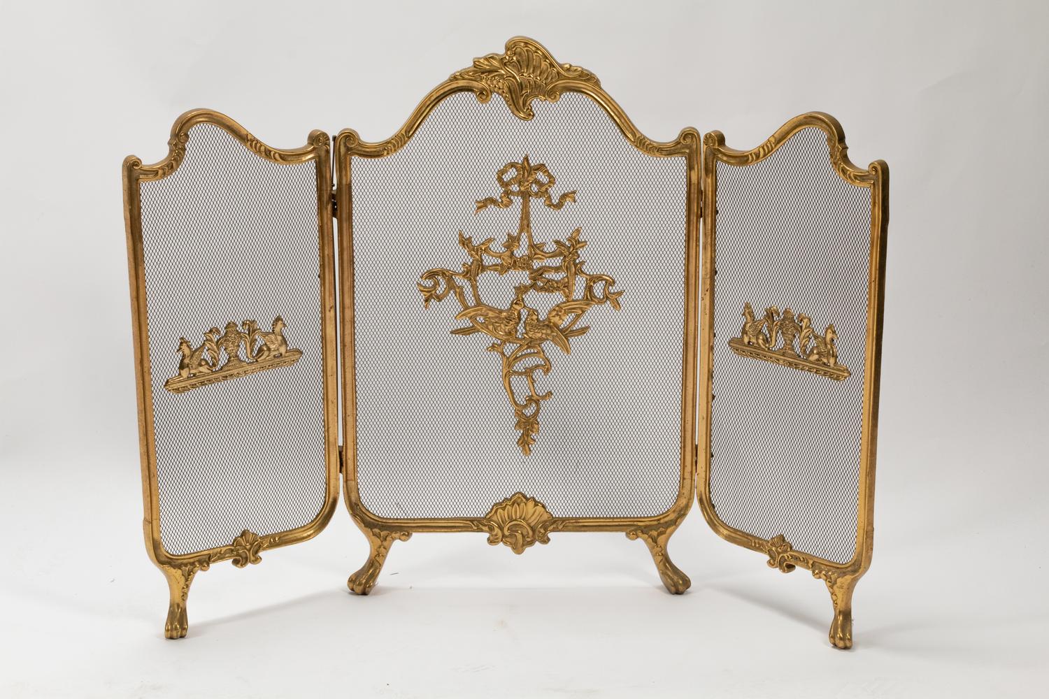 A Louis XV Style Gilt Bronze Fire Screen, a Set of Fire Tools and a Pair of Chenets