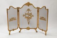 A Louis XV Style Gilt Bronze Fire Screen, a Set of Fire Tools and a Pair of Chenets