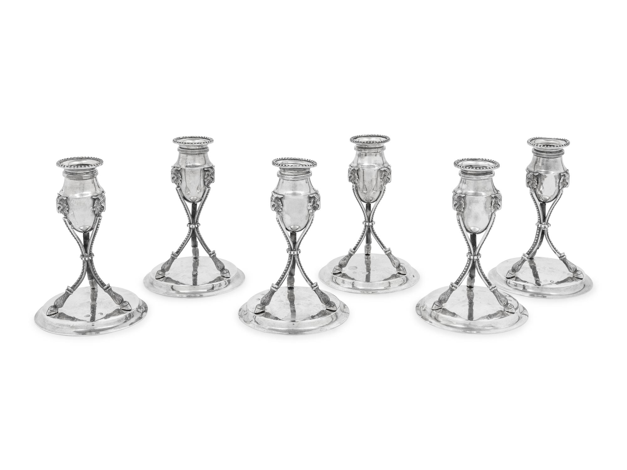 A Set of Six German Silver Candlesticks