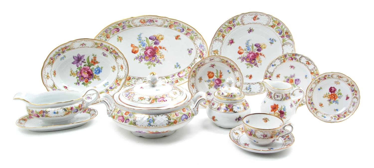 A Bavarian Porcelain Partial Dinner Service for Twelve, Schumann, Width of platter 14 3/8 inches.