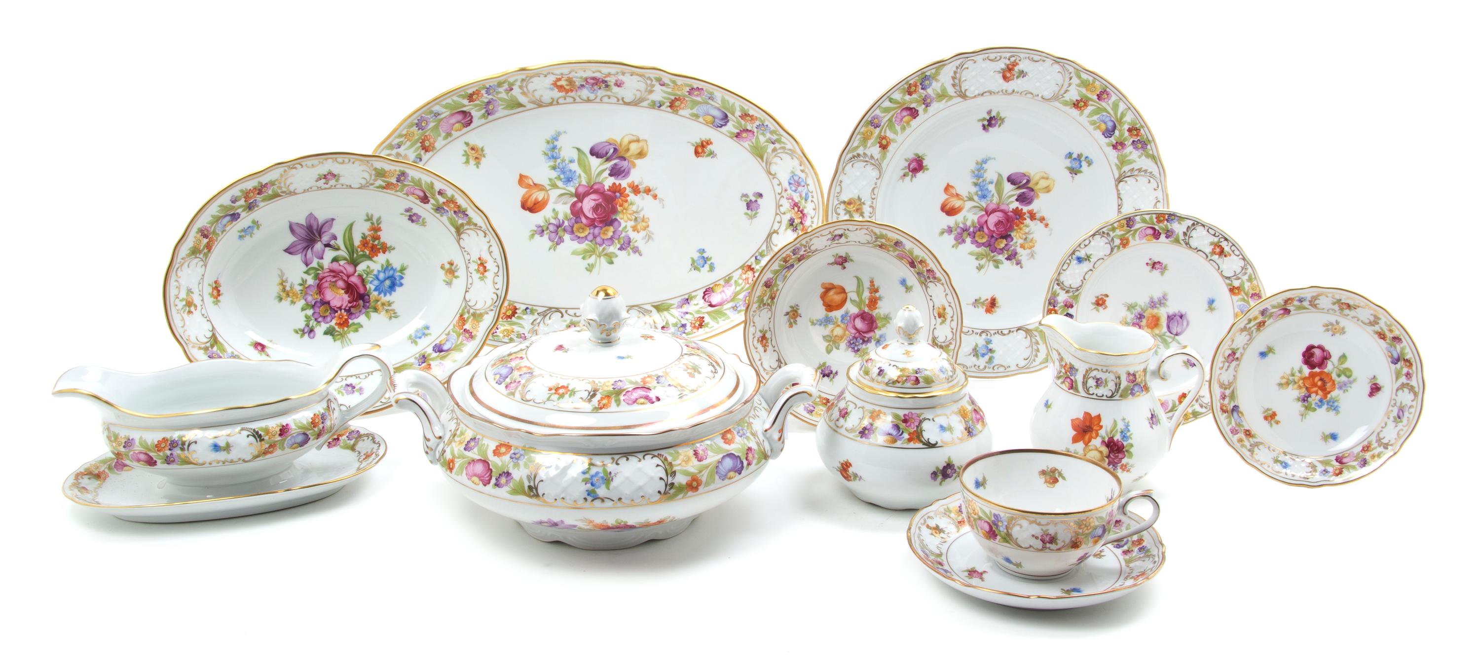 A Bavarian Porcelain Partial Dinner Service for Twelve, Schumann, Width of platter 14 3/8 inches.