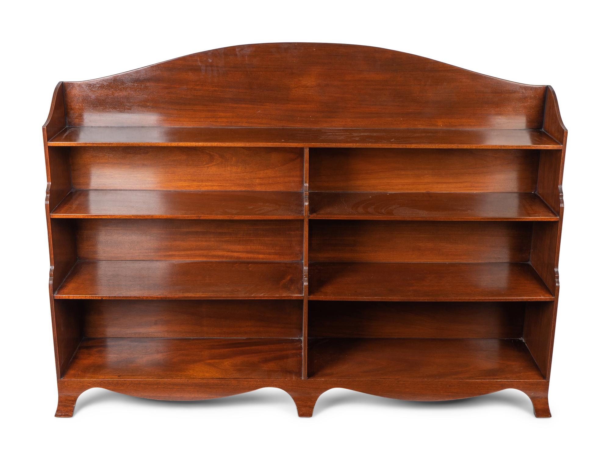An Edwardian Mahogany Waterfall Front Double Bookcase — 20TH CENTURY