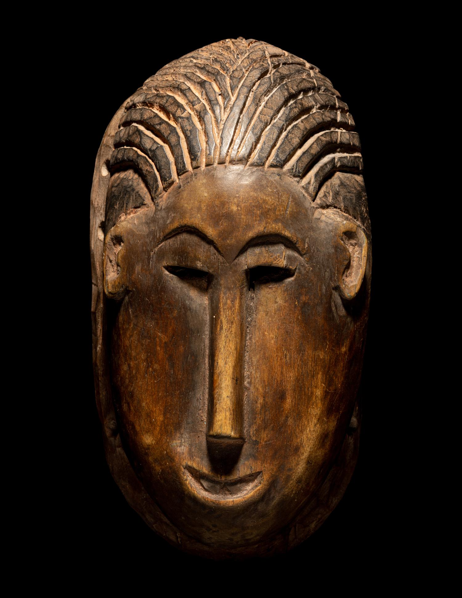 Two Bamana Wood Masks and a Janus Wood Head