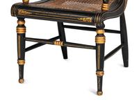 A Classical Carved, Painted and Parcel Gilt Wood Cane Seat Hitchcock Armchair